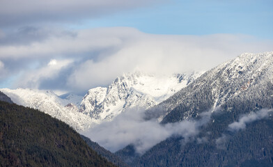 Fototapeta na wymiar Canadian Mountain Landscape Nature Background. Sunny Winter Day. Howe Sound near Squamish, British Columbia, Canada.