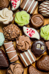 Chocolates candies with different fillings.