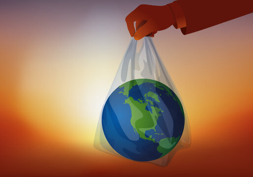Concept de la protection de l’environnement avec le symbole de la planète terre, jeté aux ordures dans un sac poubelle.