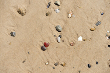 Fototapeta na wymiar Texturas de arena y piedras