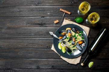 Mediterranean food. Seafood spaghetti with clams and white wine.