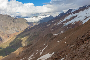 Summer panorama of Fontana Glacier, and Gepatschferner in the background. Glaciers are in rapid retreat caused by global warming. Vallelunga, Alto Adige, Italy. Popular mountain with climbers