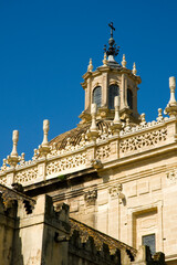 Fototapeta na wymiar Detail of the Cathedral in Seville, Spain. Sunshine, Blue sky.