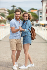 Fototapeta na wymiar romantic couple on the pier