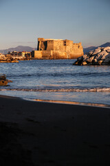 Fototapeta na wymiar Castel dell'Ovo, lietrally, the Egg Castle is a seafront castle in Naples, Italy