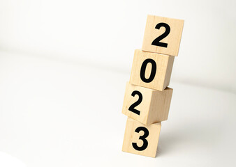 2023 New year concept. Wooden cube block with text 2023