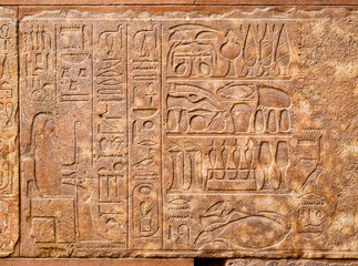 Egyptian hieroglyphs on wall in Karnak Temple, Luxor, Egypt.