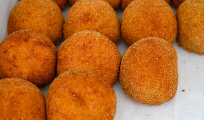 Traditional street food in UK, stuffed fried Scotch eggs with breadcrumbs