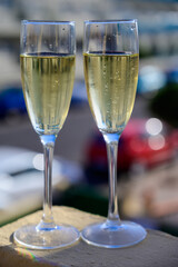 Dinner party, drinking of cava or champagne sparkling wine in vacation resort Caleta Fuste, Fuerteventura, Canary islands vacation, Spain