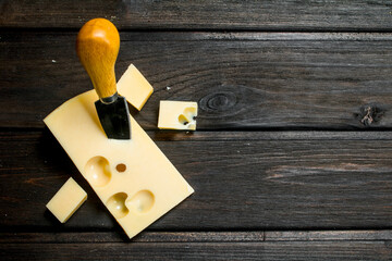 Fresh cheese with knife.