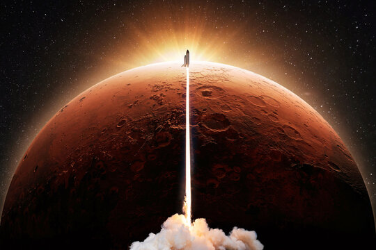 Successful space shuttle rocket launch with smoke and light blast flies to the red planet mars at sunset. New spaceship takes off up to the red planet in starry sky. Science and technology, concept - Powered by Adobe