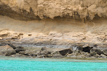 Contrast of turquoise and yellow colors at Playa La Cocina