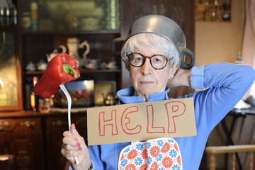 Senior woman asking for help in the kitchen 