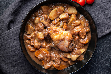 rooster in wine dish vegetable cgicken meat fresh meal food snack on the table copy space food background rustic top view