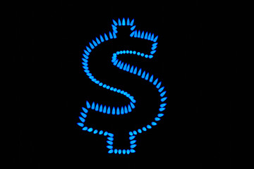 High temperature blue gas flame forms the dollar sign isolated on black background. Illustration of the concept of domestic gas prices rising