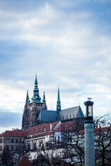 Obraz premium Taking a photograph in Karlov Bridge, Prague Bridges in the Summer on the Sunset. Czech Republic. Prague, Czech Republic. Panoramic cityscape image of famous Charles Bridge in Prague during beautiful 