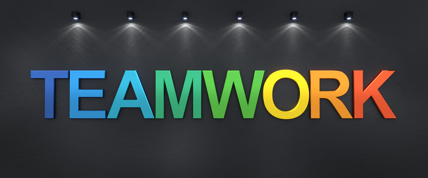 Teamwork written on black grunge wall with colorful 3d letters.