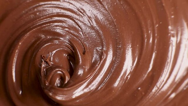 surface of the chocolate nut butter rotates, close-up