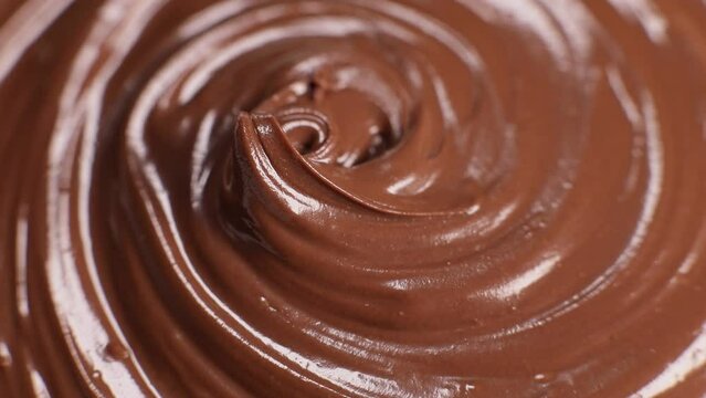 surface of the chocolate nut butter rotates, close-up