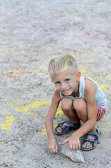 boy stained with powder paint on the occasion of Holi. Holi color festival