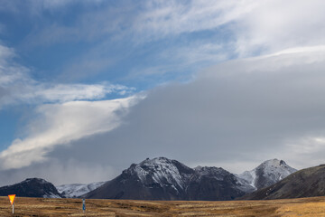 Traffic signs and mountains, Iceland