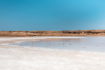Salt lake in Ras Mohamed National Park. Ras Muhammad in Egypt at the southern extreme of the Sinai Peninsula. The empty place in desert. Travel concept.