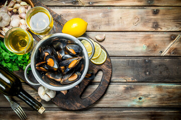 Fresh seafood clams in a pot of white wine.
