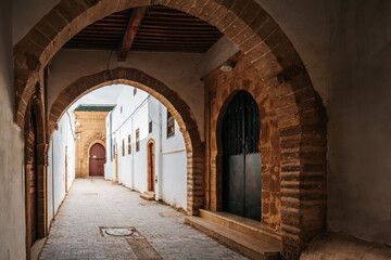 Fototapeta na wymiar Salé Medina, Morocco. Picturesque alley with an archway