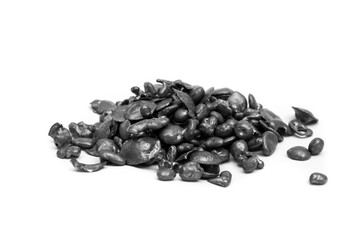 metallic gray lead pellets isolated on white background