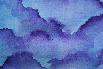 Abstract blue watercolor painting as background, top view