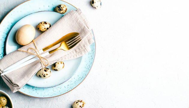 Easter Table Setting with Quail Eggs on Grey Background, Festive Happy Easter Concept
