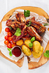 grilled ribs with baked  potatoes