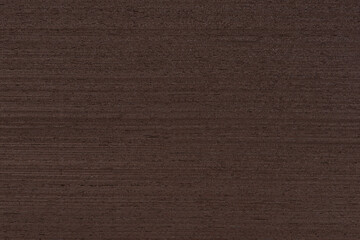 Texture of wenge wood. Dark brown wood for furniture or flooring. Close-up of a Wenge wooden plank,...