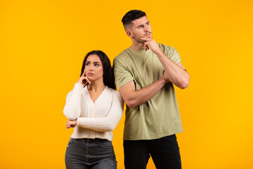 Naklejka premium Pensive millennial middle eastern husband and wife thinking, look in different directions