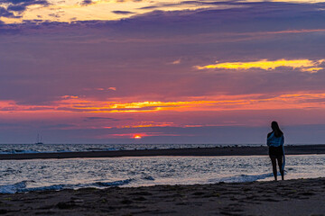 Sunset on the beach on north side of the Provincelands Cape Cod, Atlantic ocean view MA US.