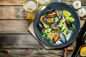 Mediterranean food. Seafood spaghetti with clams and white wine.