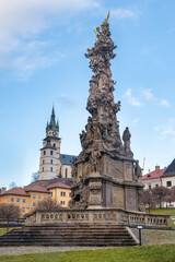 Fototapeta premium Town castle and Plague column in Kremnica, medieval mining town, Slovakia, Europe.