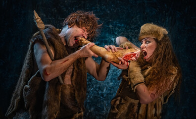 Primitive wild people divide the prey among themselves