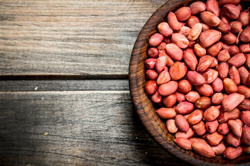 The shelled peanuts in a bowl .