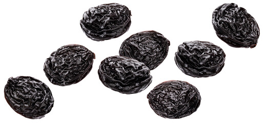 Falling prunes isolated on white background
