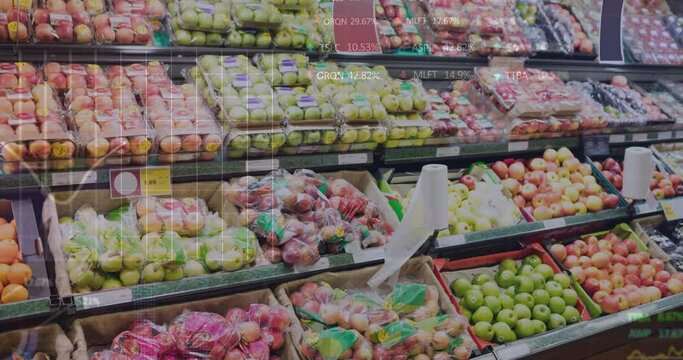 Animation of stock market data processing against fresh fruits on the shelves at a grocery store
