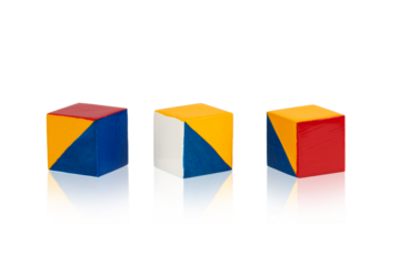 multicolored wooden cubes decorated with a geometric pattern, isolated on a transparent background