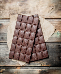 Chocolate bars on paper.