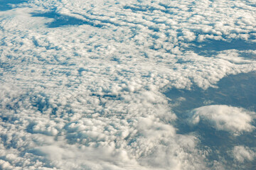 Sun rays in the cloudy sky. Nature background.