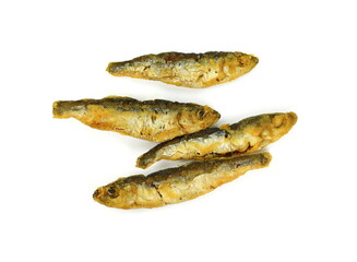 Deep Fried small Fishes Isolated On White Background. Simply food ,simply cooking - fried anchovies.