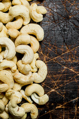 Cashew. On a wooden background