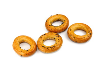 Bagels with poppy seeds on a white background. Poppy seeds bagel isolated.