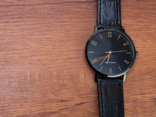 Water resistant black watch with leather strap