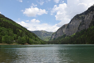 Fototapeta na wymiar The Lake of Montriond is a lake in the Chablais Alps at Montriond in the Haute-Savoie department of France