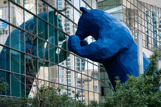 The  40-foot-high Blue Bear "I see what you mean" sculpture imparts a sense of fun and playfulness as it peers into Denver's downtown convention center.